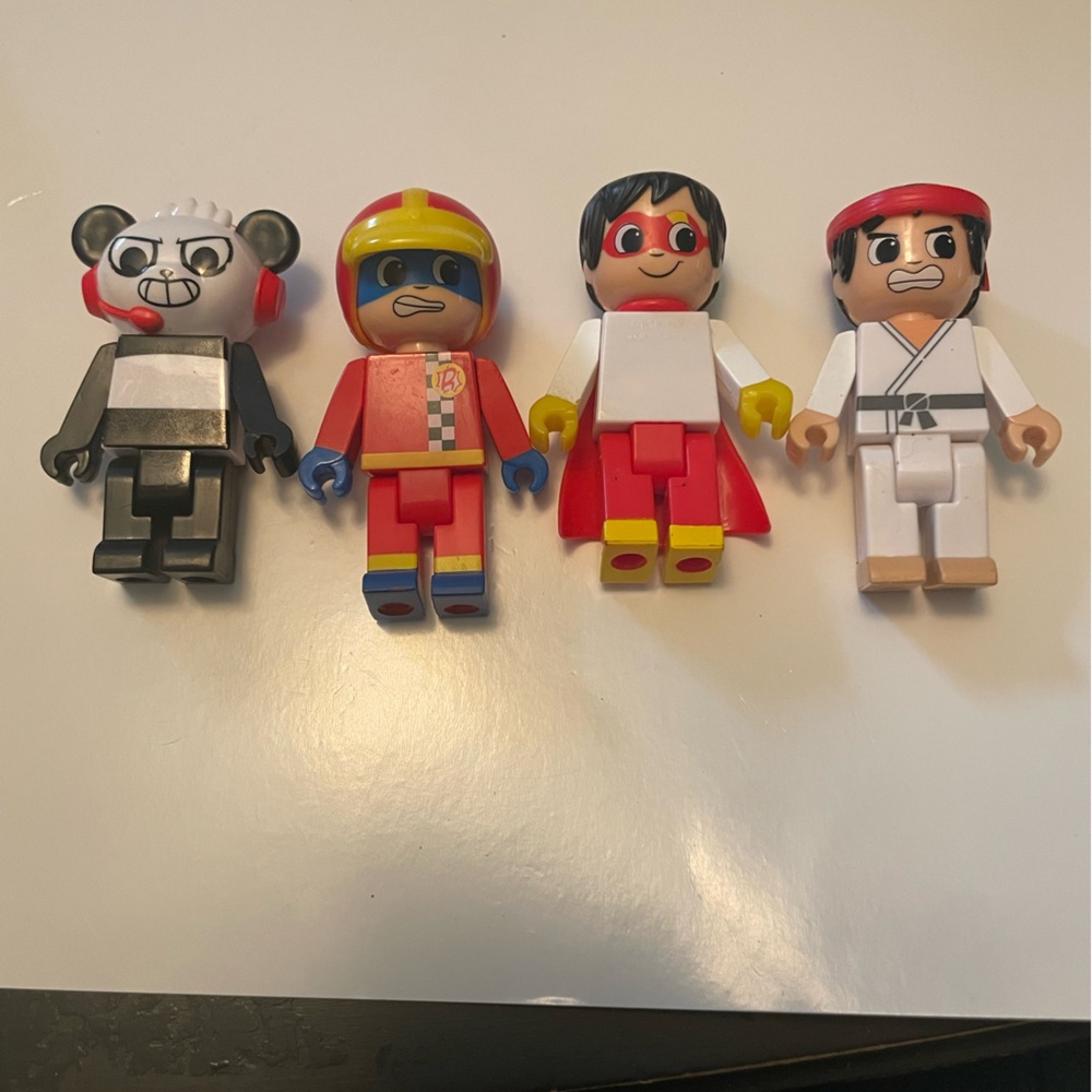 Ryan’s world Kids Toy Figures like
Legos. Karate super hero Panda racer boy